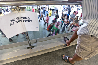 The maids hangouts often have signs such as this one found inside Lucky Plaza Shopping Centre.